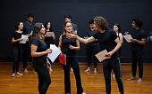 Acting students doing an improv exercise in a drama class