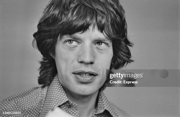 English singer Mick Jagger of rock group the Rolling Stones during an interview with Daily Express entertainment writer David Wigg, UK, 22nd July...