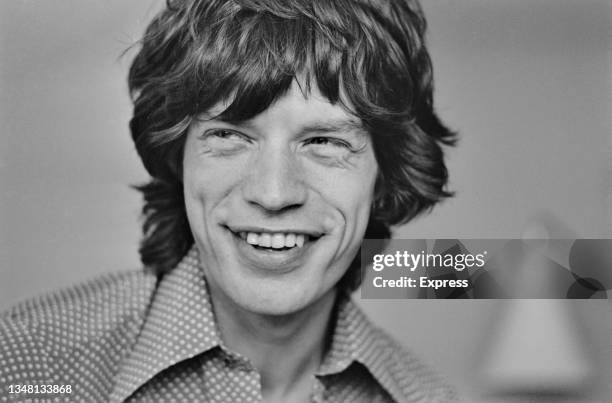 English singer Mick Jagger of rock group the Rolling Stones during an interview with Daily Express entertainment writer David Wigg, UK, 22nd July...