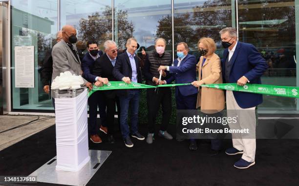 Diginitaries including Washington Governor Jay Inslee, Amazon CEO Andy Jassey, Seattle Kraken owner David Bonderman, NHL Commissioner Gary Bettman...