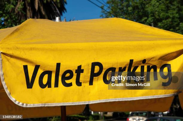 umbrella valet parking stand - valet parking restaurant stock pictures, royalty-free photos & images