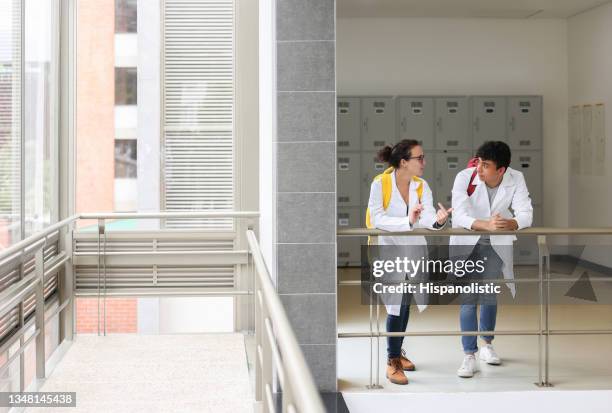 medical students talking at the university campus - civilian stock pictures, royalty-free photos & images