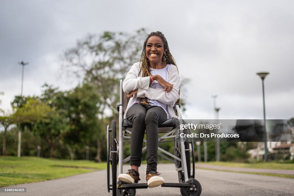 Portrait of a woman in a wheelchair.