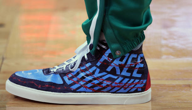 The shoes of Enes Kanter of the Boston Celtics before the Celtics home opener against the Toronto Raptors at TD Garden on October 22, 2021 in Boston,...