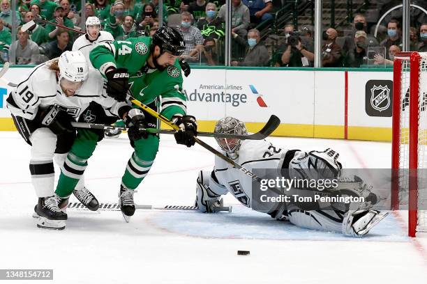 Jamie Benn of the Dallas Stars shoots the puck against Alex Iafallo of the Los Angeles Kings and Jonathan Quick of the Los Angeles Kings in the first...