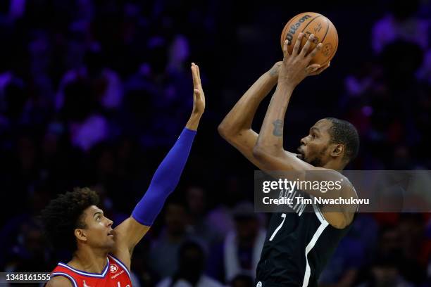 Kevin Durant of the Brooklyn Nets shoots over Matisse Thybulle of the Philadelphia 76ers during the third quarter at Wells Fargo Center on October...
