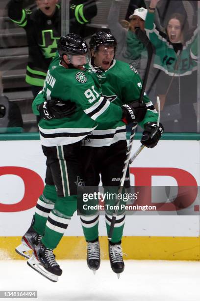 Denis Gurianov of the Dallas Stars celebrates with Tyler Seguin of the Dallas Stars after scoring the game-winning overtime goal against the Los...