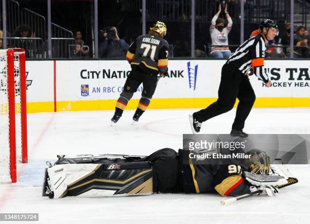 Robin Lehner of the Vegas Golden Knights lies on the ice after giving up a goal to Zack Kassian of the Edmonton Oilers in the third period of their...