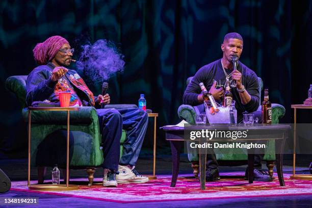 Snoop Dogg and Jamie Foxx speak on stage on the final night of Jamie Foxx: Act Like You Got Some Sense Book Tour at The Magnolia on October 22, 2021...