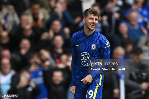 Mason Mount of Chelsea celebrates after scoring their side's sixth goal from the penalty spot during the Premier League match between Chelsea and...