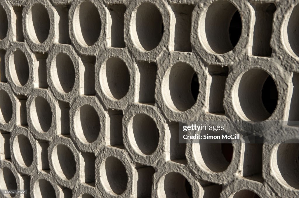 Cinder/breeze block wall painted beige/cream