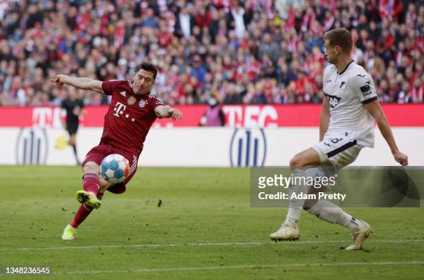 Robert Lewandowski of FC Bayern Muenchen scores their team's second goal during the Bundesliga match between FC Bayern München and TSG Hoffenheim at...