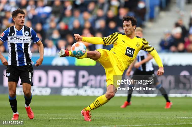 Mats Hummels of Borussia Dortmund scores their team's second goal during the Bundesliga match between DSC Arminia Bielefeld and Borussia Dortmund at...