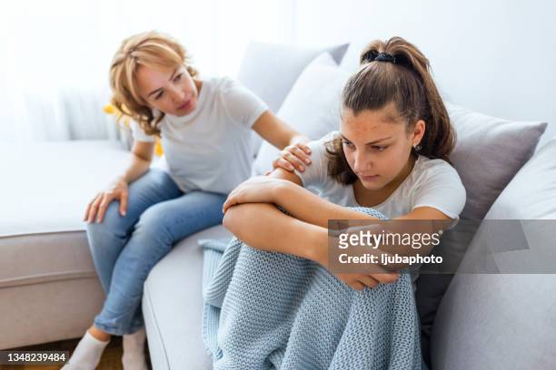 mature woman consoling her daughter - girl asking stock pictures, royalty-free photos & images