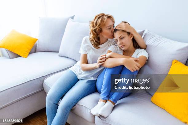 mother's love - girl asking stock pictures, royalty-free photos & images