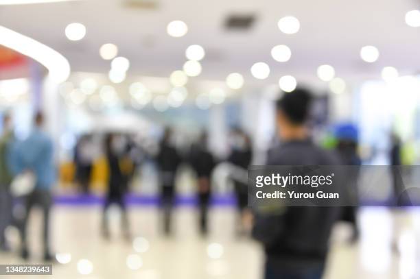 defocus background of public exhibition in trade show . abstract background used for business. - exhibition booth stock pictures, royalty-free photos & images