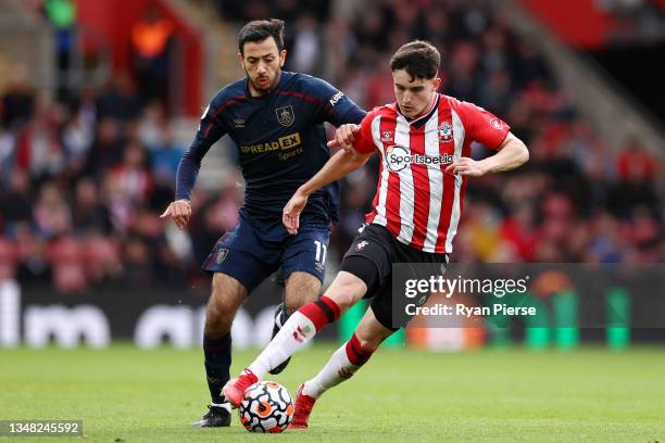 Valentino Livramento of Southampton is closed down by Dwight McNeil of Burnley during the Premier League match between Southampton and Burnley at St...