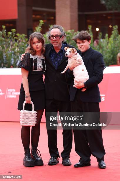 Nell Burton, Tim Burton, Billy-Ray Burton and Levi the dog attend the Tim Burton Close Encounter red carpet during the 16th Rome Film Fest 2021 on...