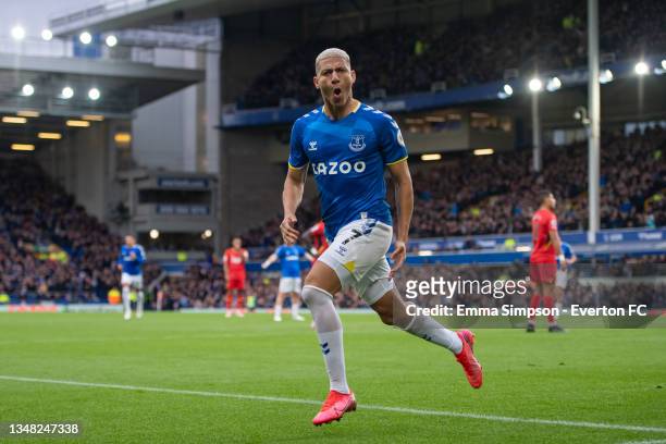 Richarlison of Everton celebrates scoring his teams second goal during the Premier League match between Everton and Watford at Goodison Park on...