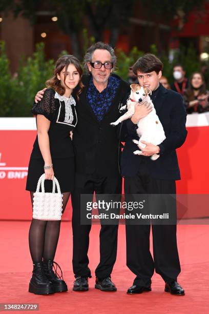 Nell Burton, Tim Burton, Billy-Ray Burton and Levi the dog attend the Tim Burton Close Encounter red carpet during the 16th Rome Film Fest 2021 on...