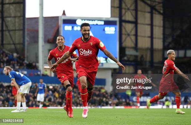 Joshua King of Watford FC celebrates after scoring their side's fourth goal during the Premier League match between Everton and Watford at Goodison...