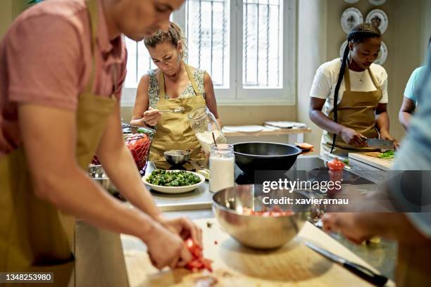 adult students preparing ingredients for gazpacho - spanish food stock pictures, royalty-free photos & images