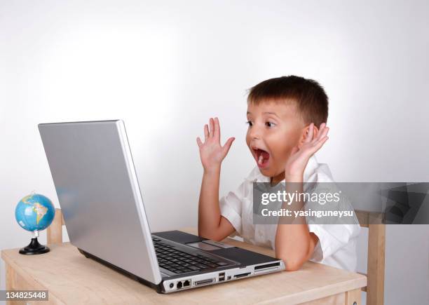 boy shock ! - ominous computer stock pictures, royalty-free photos & images