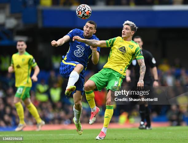 Mathias Normann of Norwich City and Mateo Kovacic of Chelsea challenge for the ball during the Premier League match between Chelsea and Norwich City...