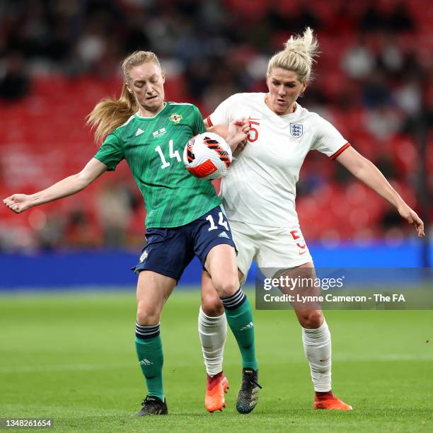 Lauren Wade of Northern Ireland battles for possession with Millie Bright of England during the FIFA Women's World Cup 2023 Qualifier group D match...