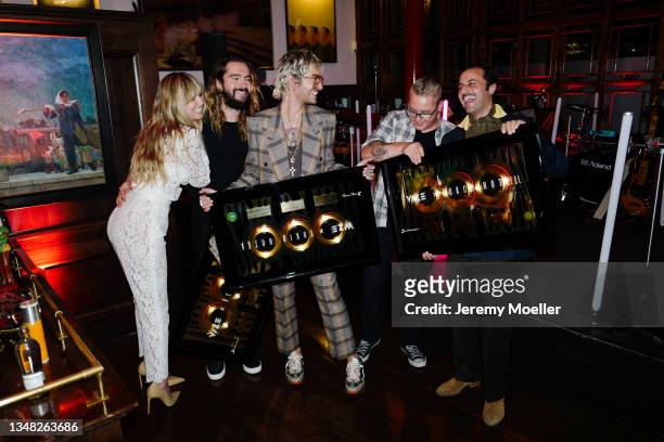 Heidi Klum, Bill Kaulitz, Tom Kaulitz, Gustav Schäfer and Georg Listing seen backstage during the Tokio Hotel New Album Release Party on October 22,...