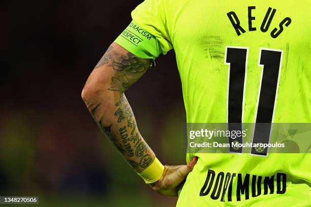 Detailed look at the tattoos of Captain, Marco Reus of Borussia Dortmund during the UEFA Champions League group C match between AFC Ajax and Borussia...