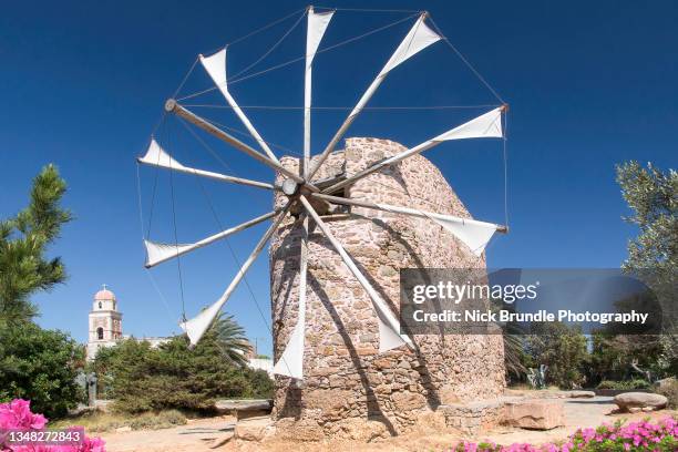 windmill, toplou monastery, crete, greece. - plateau stock pictures, royalty-free photos & images