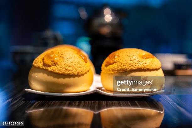 close-up of pineapple bread on the table - hong kong dessert stock pictures, royalty-free photos & images