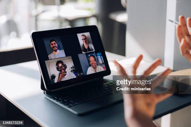 unrecognizable businesswoman talking on conference call meeting - e learning concept stock pictures, royalty-free photos & images