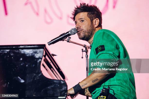 Spanish singer Pablo Lopez performs on stage during the 'Por Ellas' charity concert against breast cancer at WiZink Center on October 23, 2021 in...