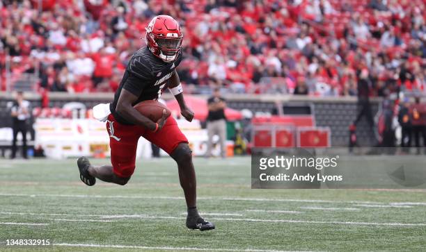 Malik Cunningham of the Louisville Cardinals runs for a touchdown against the Boston College Eagles at Cardinal Stadium on October 23, 2021 in...