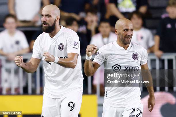 Gonzalo Higuain and Federico Higuain of Inter Miami CF celebrate after a goal in the 53' minute against FC Cincinnati during the second half at DRV...