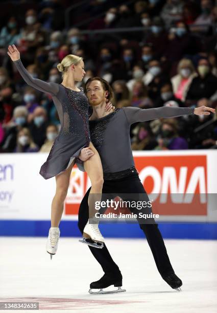 Evgenia Tarasova and Vladimir Morozov of Russia compete in the Pairs Free Program during the ISU Grand Prix of Figure Skating - Skate America at...