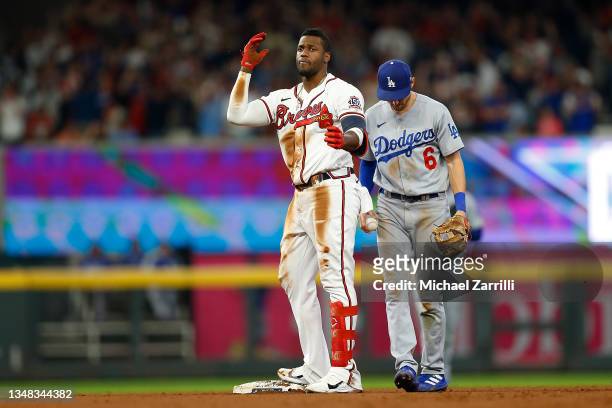 Jorge Soler of the Atlanta Braves reacts to a double during the eighth inning of Game Six of the National League Championship Series against the Los...