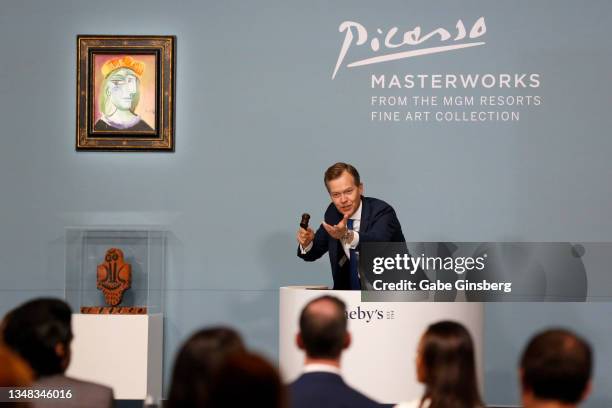 Sotheby's auctioneer Oliver Barker interacts with the audience during the Sotheby's "Picasso: Masterworks From The MGM Resorts Fine Art Collection"...