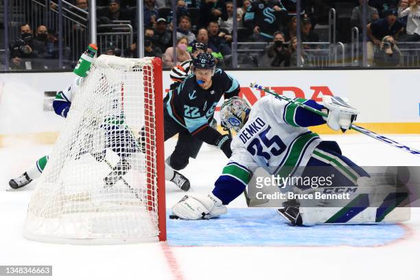 Thatcher Demko of the Vancouver Canucks makes the save against against the Seattle Kraken in the second period during the Kraken's inaugural home...