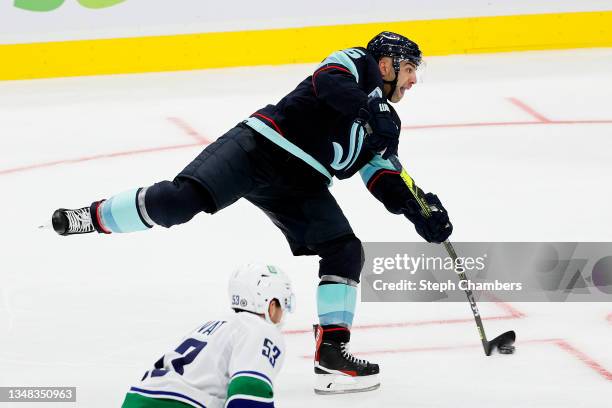 Mark Giordano of the Seattle Kraken scores a goal against the Vancouver Canucks in the third period during the Kraken's inaugural home opening game...