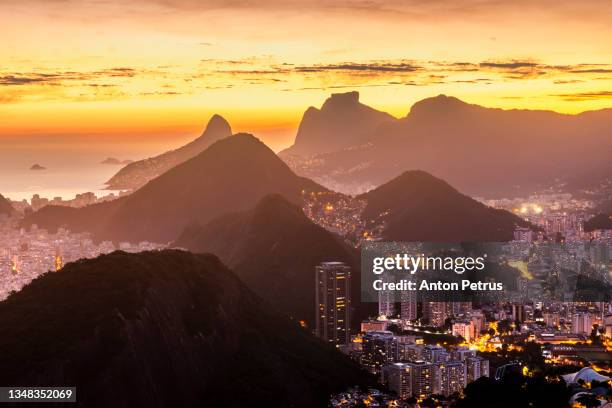 beautiful panorama of rio de janeiro at twilight, brazil. city view at sunset - latin america cities stock pictures, royalty-free photos & images