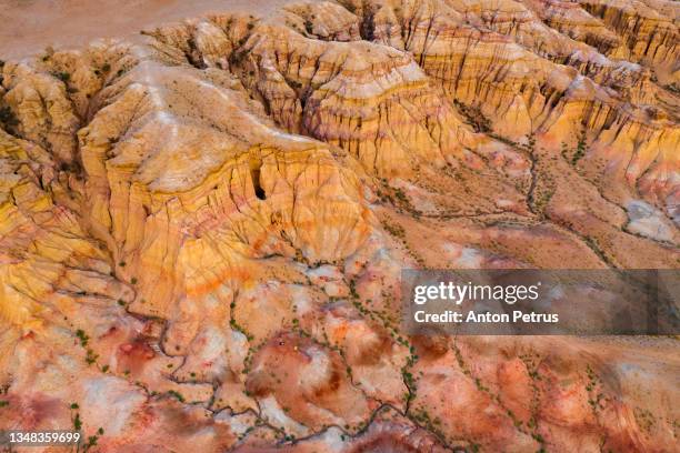 tsagaan suvarga (white stupa) at sunrise. gobi desert, mongolia. aerial view - kampeertent stockfoto's en -beelden