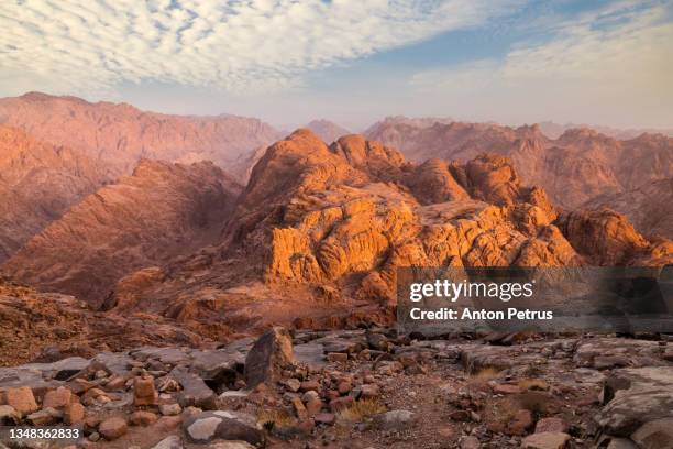 view from mount sinai at sunrise. beautiful mountain landscape in egypt - sinai egypt stockfoto's en -beelden