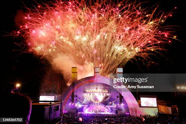 Jonny Buckland, Will Champion, Chris Martin, and Guy Berryman of Coldplay performs onstage during the 8th annual "We Can Survive" concert hosted by...