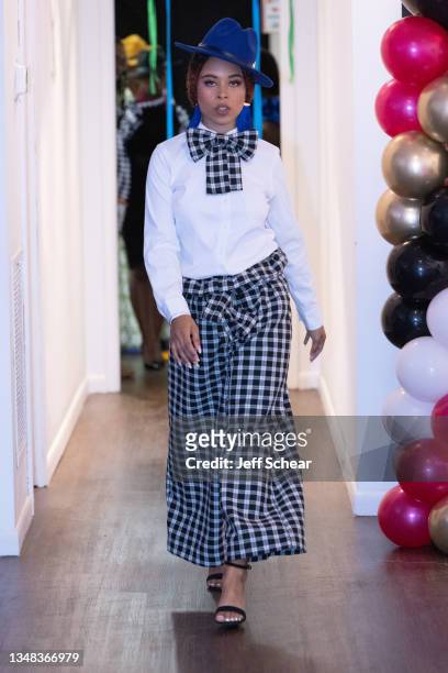 Model walks the runway during the Finale Showcase at the MCW Original fashion show at FTM Fashion Week Season 9 at the Jacksonville Onslow Council...