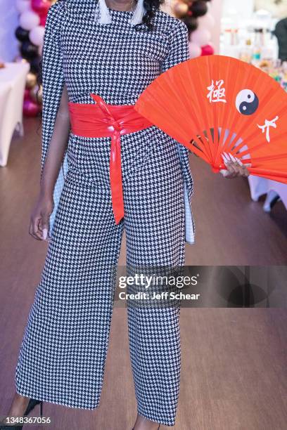 Model walks the runway during the Finale Showcase at the MCW Original fashion show at FTM Fashion Week Season 9 at the Jacksonville Onslow Council...