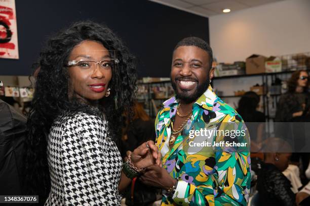 Host Midori Amae and Septimius The Great backstage at FTM Fashion Week Season 9 at the Jacksonville Onslow Council for the Arts on October 23, 2021...