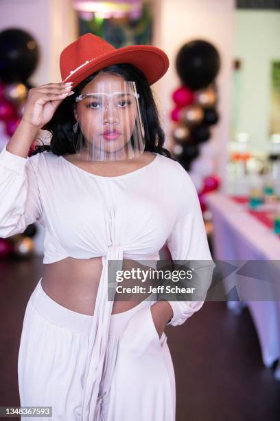 Model walks the runway during the Ready 2 Wear I am Via Botique fashion show at FTM Fashion Week Season 9 at the Jacksonville Onslow Council for the...